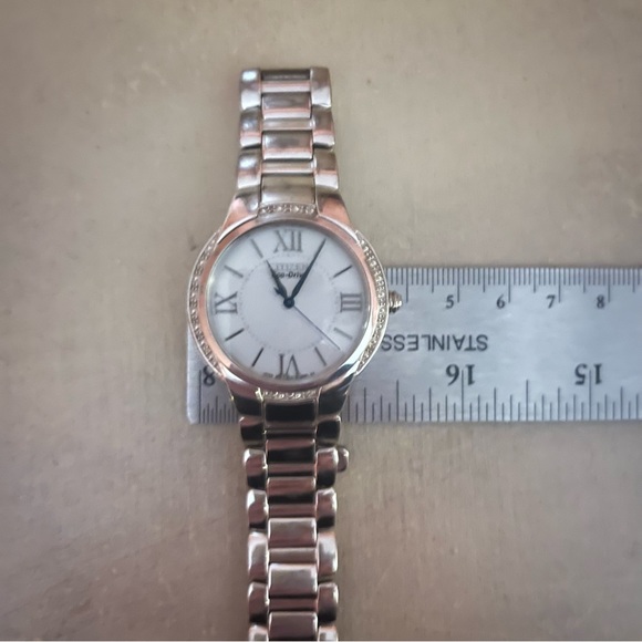CITIZEN ECODRIVE SILVER TONE BRACET WATCH W/ TINY DIAMOND CHIP ACCENTS. - Picture 9 of 16